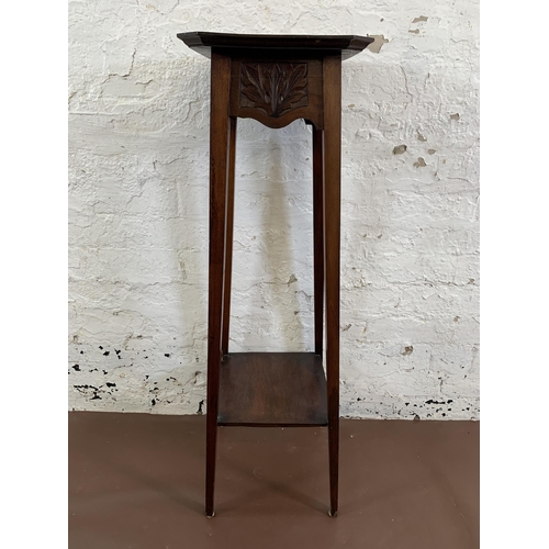 170A - An Edwardian carved and inlaid mahogany two tier jardinière stand  - approx. 98cm high x 30cm square