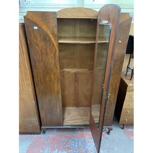 174 - An Art Deco walnut single door wardrobe - approx. 193cm high x 118cm wide x 48cm deep