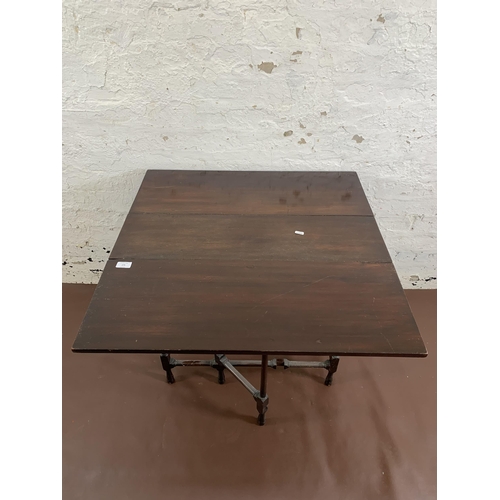 175 - A late 19th/early 20th century mahogany drop leaf spider table - approx. 65cm high x 77cm wide x 76c... 