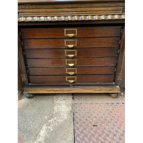 82 - A mid 20th century oak bureau with six fitted drawers - approx. 100cm high x 73cm high x 47cm deep