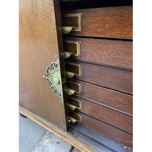 82 - A mid 20th century oak bureau with six fitted drawers - approx. 100cm high x 73cm high x 47cm deep