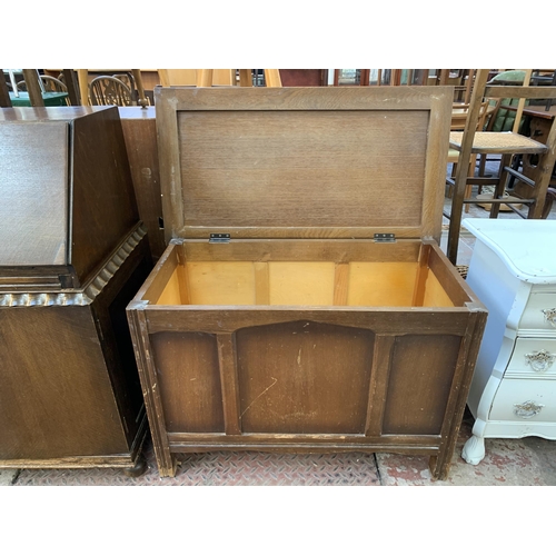 83 - A mid 20th century oak blanket box - approx. 60cm high x 90cm wide x 49cm deep