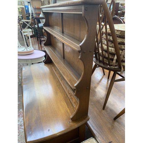 89 - An Ercol Golden Dawn elm dresser - approx. 160cm high x 123cm wide x 48cm deep