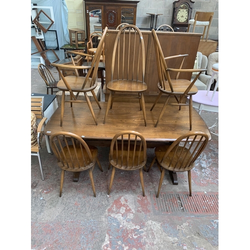 92 - An Ercol Golden Dawn elm and beech dining table and six Quaker dining chairs - table approx. 72cm hi... 