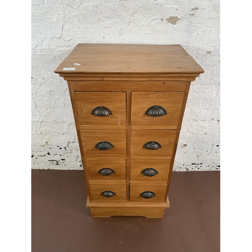 94 - A modern teak chest of drawers - approx. 90cm high x 47cm wide x 38cm deep