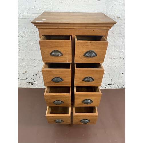 94 - A modern teak chest of drawers - approx. 90cm high x 47cm wide x 38cm deep