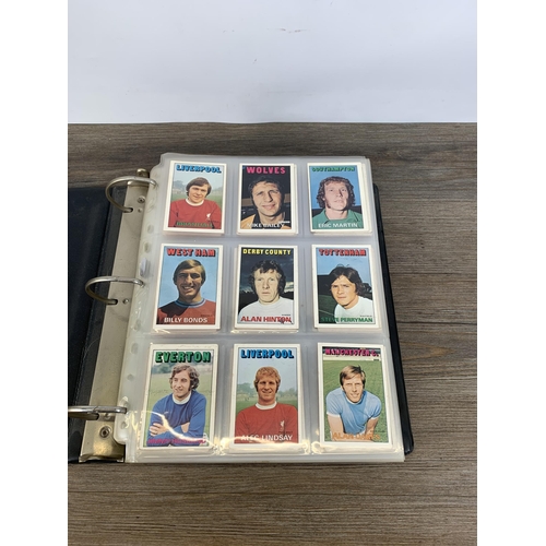 380 - Three albums and two boxes containing a large collection of vintage football collector's cards to in... 