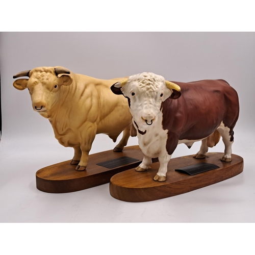 294 - Two Beswick Connoisseur models on wooden plinths, one Hereford Bull and one Charolais