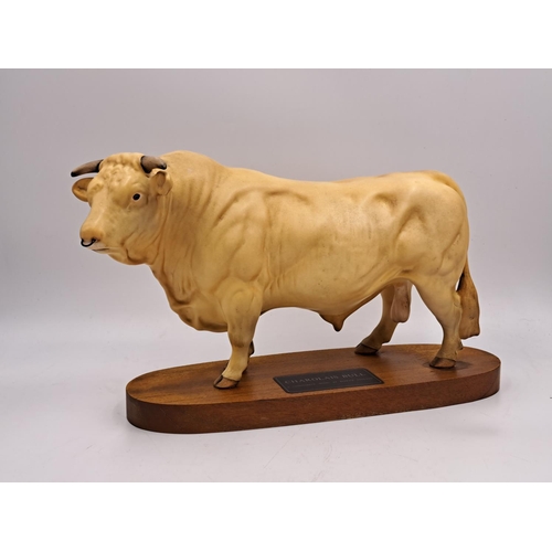 294 - Two Beswick Connoisseur models on wooden plinths, one Hereford Bull and one Charolais