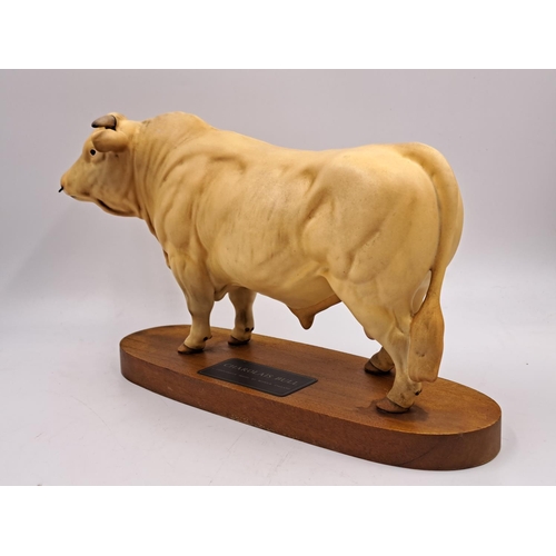 294 - Two Beswick Connoisseur models on wooden plinths, one Hereford Bull and one Charolais