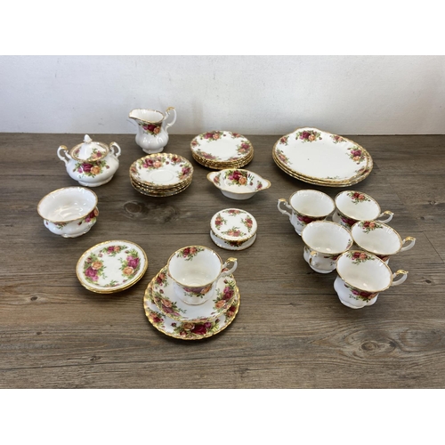 303 - A collection of Royal Albert Old Country Roses bone china to include six teacups, saucer and side pl... 