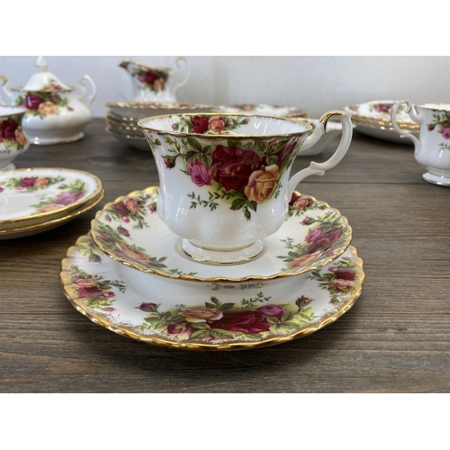 303 - A collection of Royal Albert Old Country Roses bone china to include six teacups, saucer and side pl... 