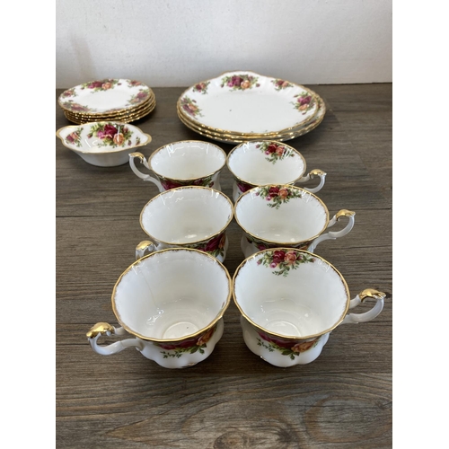 303 - A collection of Royal Albert Old Country Roses bone china to include six teacups, saucer and side pl... 