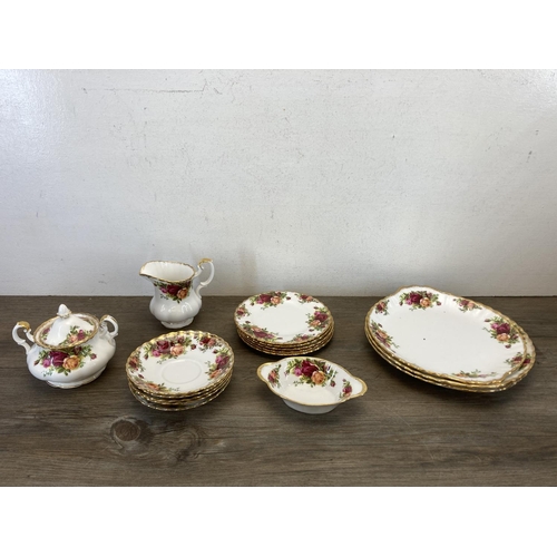 303 - A collection of Royal Albert Old Country Roses bone china to include six teacups, saucer and side pl... 