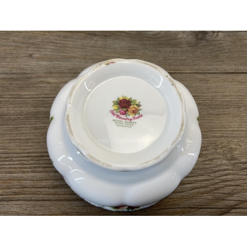 303 - A collection of Royal Albert Old Country Roses bone china to include six teacups, saucer and side pl... 