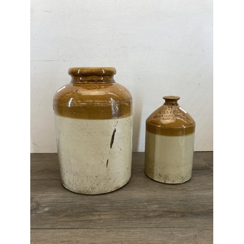 305 - Four pieces of early 20th century salt glazed stoneware, three flagons and one jar