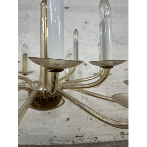 502 - A Christopher Wray sixteen branch glass chandelier