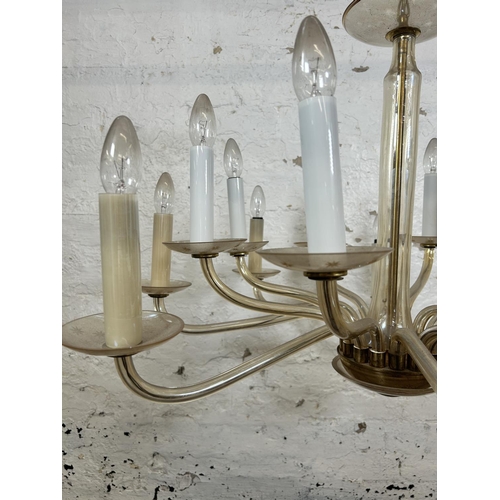 502 - A Christopher Wray sixteen branch glass chandelier