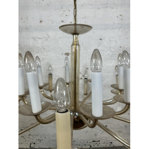 502 - A Christopher Wray sixteen branch glass chandelier