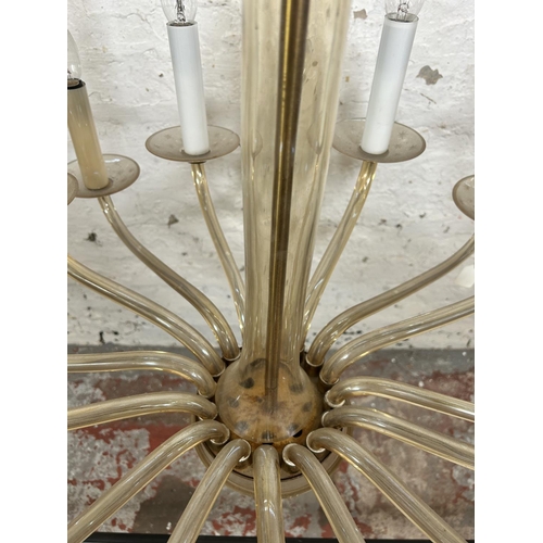 502 - A Christopher Wray sixteen branch glass chandelier