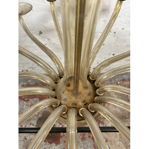 502 - A Christopher Wray sixteen branch glass chandelier