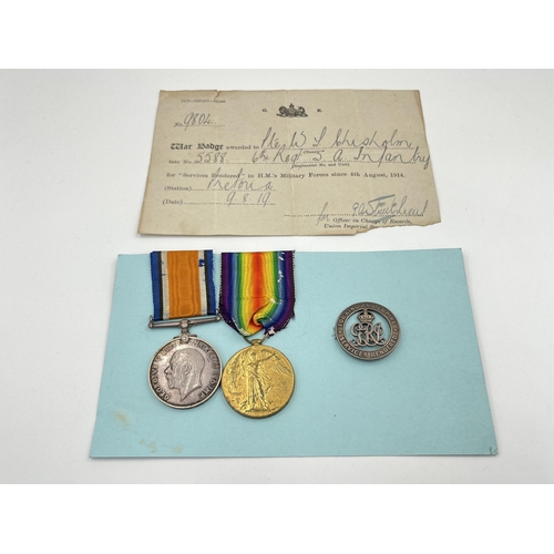 2029 - Three WWI South African items presented to 5588 Pte. W. T. Chrisholm 6th S.A.I., one medal pair and ... 