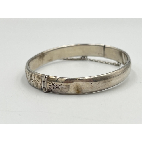 2234 - A Charles Horner hallmarked Chester silver foliate etched bangle, dated 1915 - approx. gross weight ... 