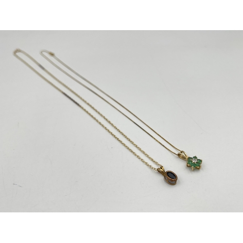 2243 - Two 9ct gold gemstone set pendant necklaces, one emerald and one sapphire - approx. gross weight 2.1... 