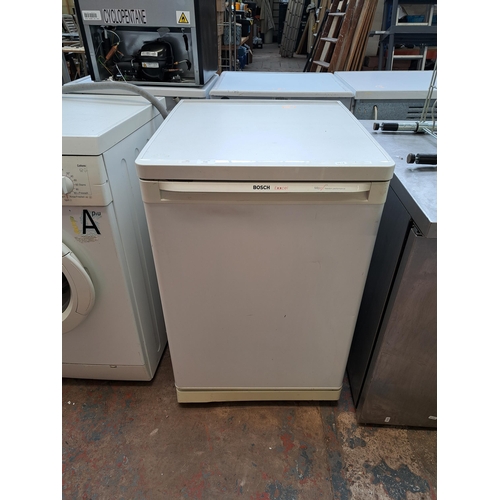 716 - A Bosch Exxcel 55cm under counter freezer