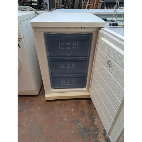 716 - A Bosch Exxcel 55cm under counter freezer