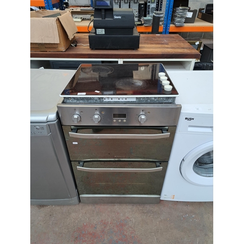 730 - Two items, one Hotpoint integrated twin oven cooker and one Whirlpool four burner hob