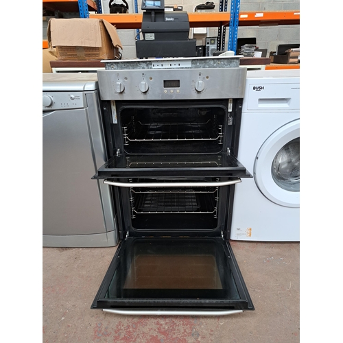 730 - Two items, one Hotpoint integrated twin oven cooker and one Whirlpool four burner hob