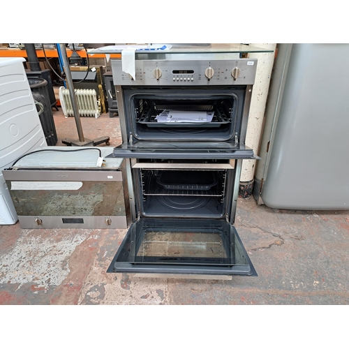 733 - Three Smeg integrated appliances, one DOSF44X twin oven cooker with instruction manual, one MP422X m... 