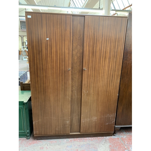 154 - A mid 20th century Wrighton mahogany double wardrobe - approx. 177cm high x 122cm wide x 53cm deep