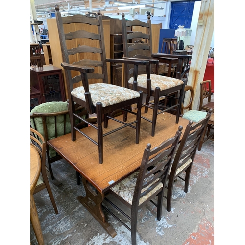 157 - An oak rectangular dining table and six beech ladder back chairs - table approx. 74cm high x 78cm wi... 