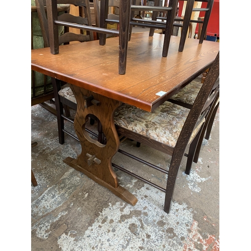 157 - An oak rectangular dining table and six beech ladder back chairs - table approx. 74cm high x 78cm wi... 