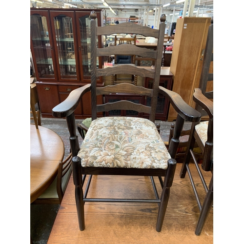 157 - An oak rectangular dining table and six beech ladder back chairs - table approx. 74cm high x 78cm wi... 