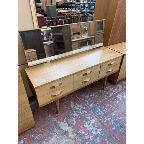 194 - A mid 20th century Austinsuite teak dressing table - approx. 120cm high x 152cm wide x 44cm deep