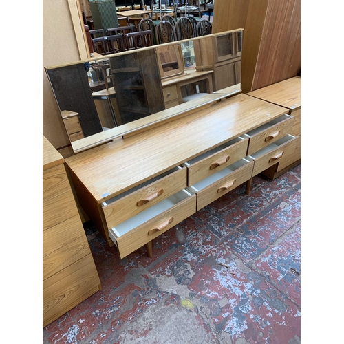 194 - A mid 20th century Austinsuite teak dressing table - approx. 120cm high x 152cm wide x 44cm deep