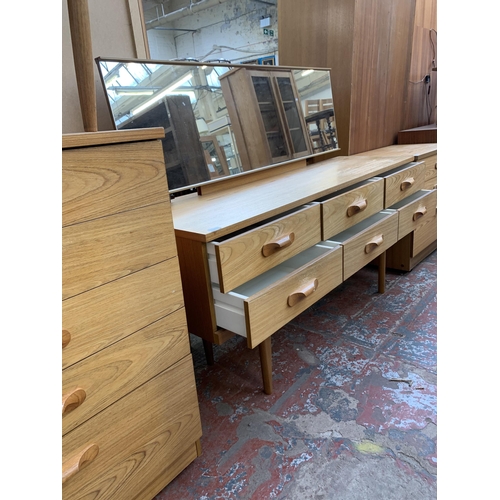 194 - A mid 20th century Austinsuite teak dressing table - approx. 120cm high x 152cm wide x 44cm deep