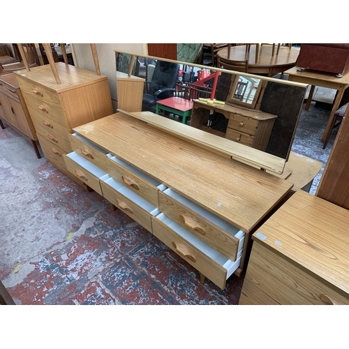 194 - A mid 20th century Austinsuite teak dressing table - approx. 120cm high x 152cm wide x 44cm deep