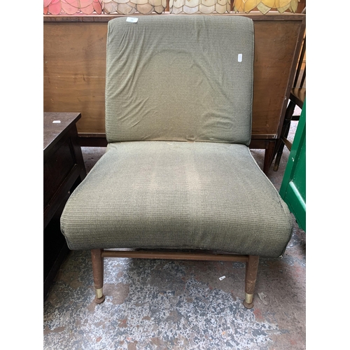 200 - A mid 20th century green fabric upholstered and beech lounge chair - approx. 75cm high x 53cm wide x... 