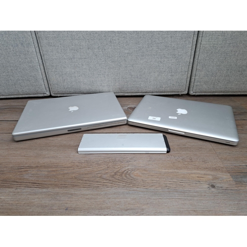 840 - Two Apple laptops, one A1278 MacBook Pro and one A1095 PowerBook G4 together with an Apple A1281 Mac... 