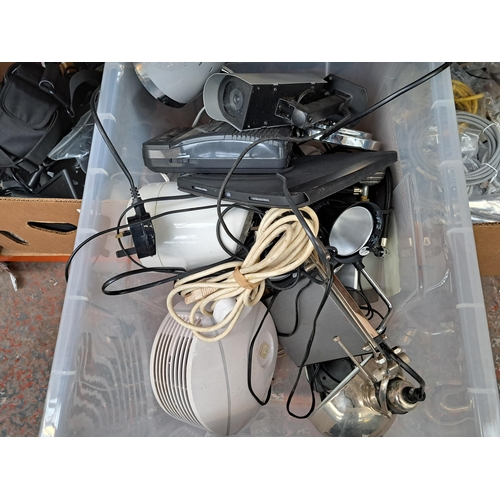 848 - Four boxes containing a large collection of tech related items to include ethernet cables, Garmin sa... 