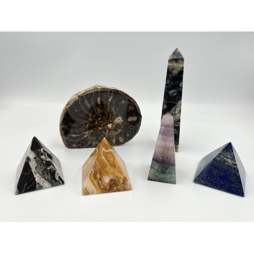 2024 - A collection of semi precious stone ornaments to include fossilised ammonite disk, rainbow fluorite,... 