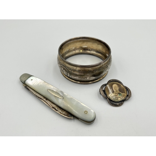 2045 - Three items, one .925 sterling silver brooch, one hallmarked Sheffield silver and mother of pearl ha... 