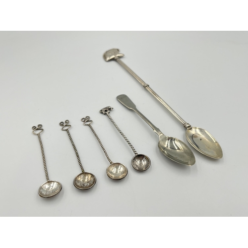 2046 - Six continental silver and white metal spoons to include one Egyptian silver with birds head design,... 