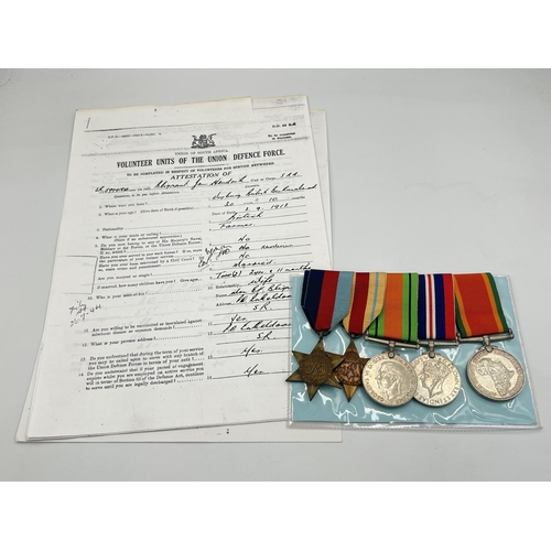 2048 - Five WWII South African medals, one presented to SR. 599418 J.H. Blignaut with associated military p... 