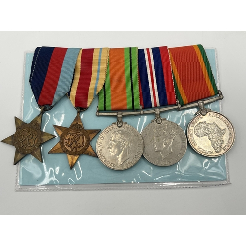 2048 - Five WWII South African medals, one presented to SR. 599418 J.H. Blignaut with associated military p... 