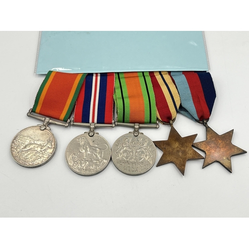 2048 - Five WWII South African medals, one presented to SR. 599418 J.H. Blignaut with associated military p... 